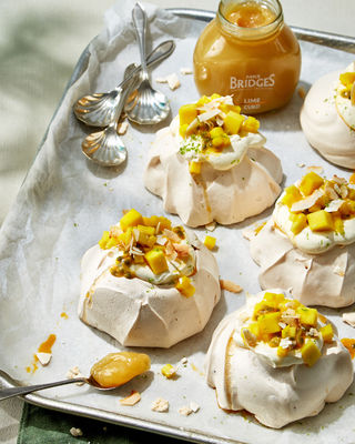 Mini pavlovas with mango, lime & coconut