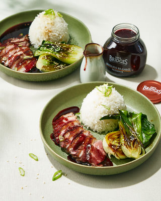 Glazed Duck with sweet & sour blackberry sauce and pak choi