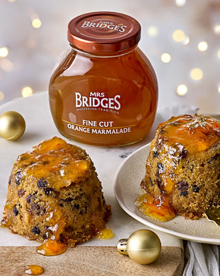 Mini Christmas puddings with a marmalade glaze